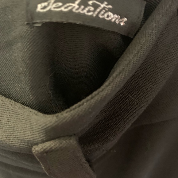 Black dressy skirt with belt loops. Small slit in back - Picture 3 of 5